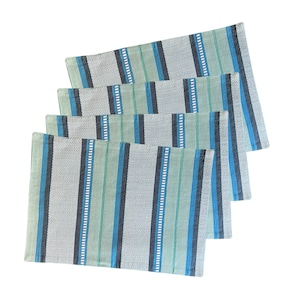 Set of 4 Blue, Turquoise & White Striped fabric placemats offer a Nautical/Beach/Coastal feeling in high quality cotton for a crisp touch.