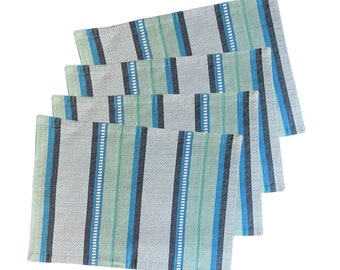 Set of 4 Blue, Turquoise & White Striped fabric placemats offer a Nautical/Beach/Coastal feeling in high quality cotton for a crisp touch.