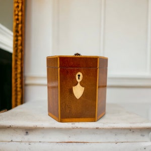 Octagonal Georgian Tea Caddy Box, Antique & Wooden adorned w/ inland ivory detailing around the keyhole and emblem design. Tea lover gift.
