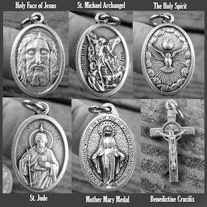 May include: A set of ten silver-toned religious medallions with various images, including the Holy Face of Jesus, St. Michael Archangel, the Holy Spirit, St. Jude, Mother Mary, and a Benedictine Crucifix.