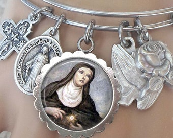 Juliana Of Cumae Charm On A 8 1/2 Inch Round Double Loop Bangle Bracelet St Juliana Of Cumae Charm On A 8 1/2 Inch Round Double Loop Bangle Bracelet St