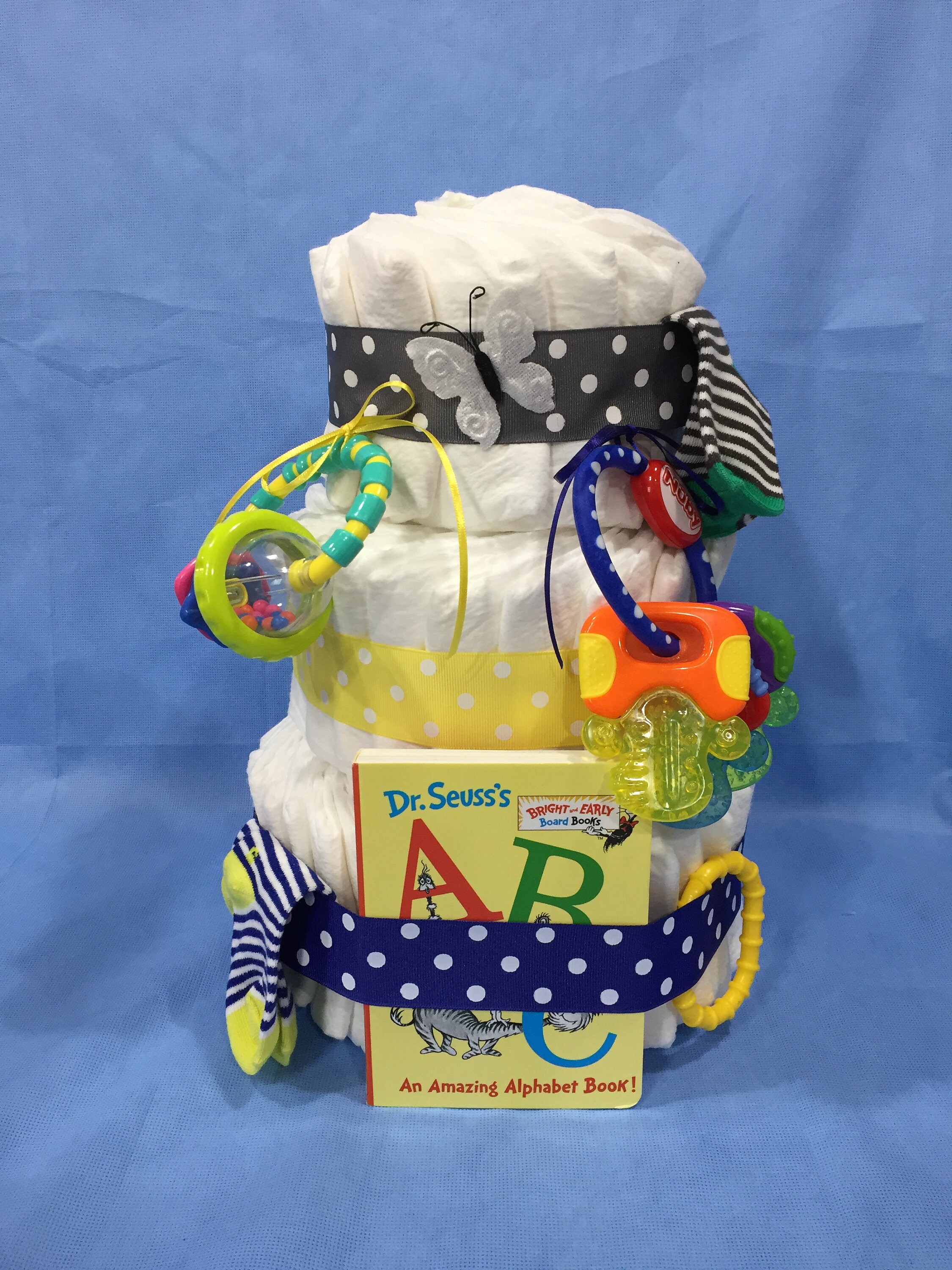 Dr Seuss's ABC Book 3 Tier Diaper Cake with Teether Keys, Rattle, Socks