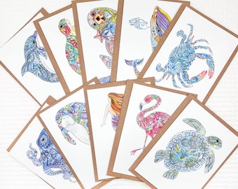 Set of Coastal themed notecards, featuring a whale, sea otter, sea turtles, manatee, mermaid, flamingo, blue crab, dolphin and octopus