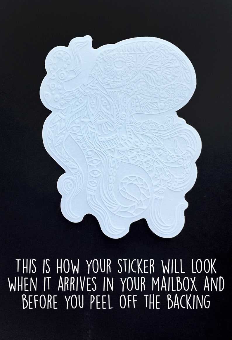 May include: White sticker featuring a detailed, intricate design of a stylised octopus with flowing tentacles. The sticker is on a black background.
