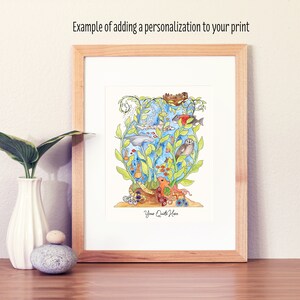 May include: A framed watercolour illustration of an underwater scene with a variety of sea creatures, including fish, a dolphin, a seahorse, and an octopus. The illustration is surrounded by green seaweed and has the text "Your Quote Here" at the bottom.