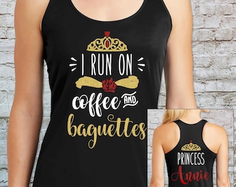 May include: Black tank top with gold glitter text that reads "I run on coffee and baguettes". The back of the tank top has a gold glitter crown and the text "Princess Annie".