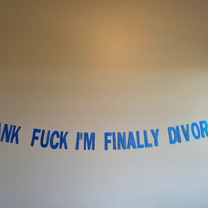 May include: A blue glitter banner with the text "THANK FUCK I'M FINALLY DIVORCED".