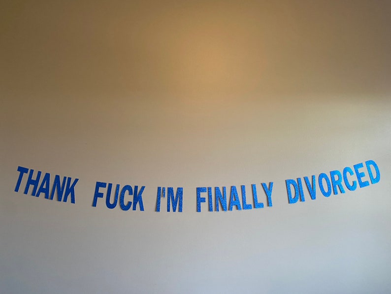 May include: A blue glitter banner with the text "THANK FUCK I'M FINALLY DIVORCED".