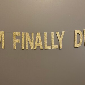 May include: Gold glitter banner with the text "I FINALLY DID IT".