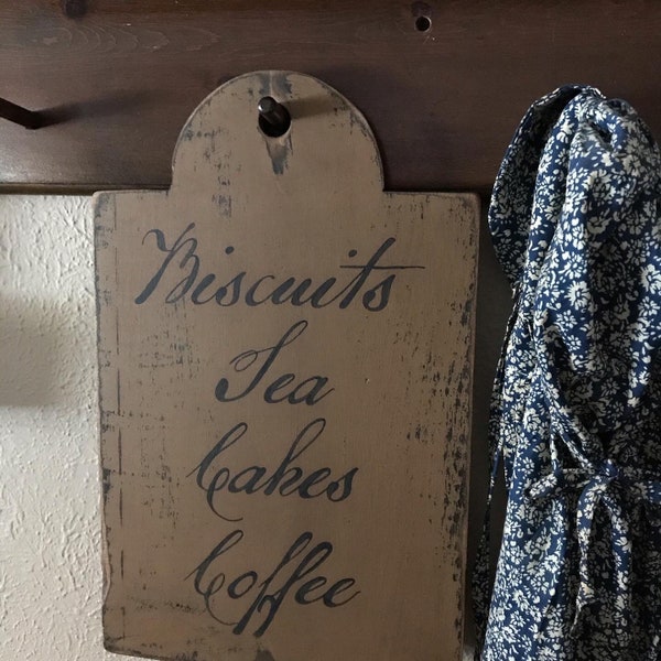 Primitive colonial kitchen, coffee shop offerings sign