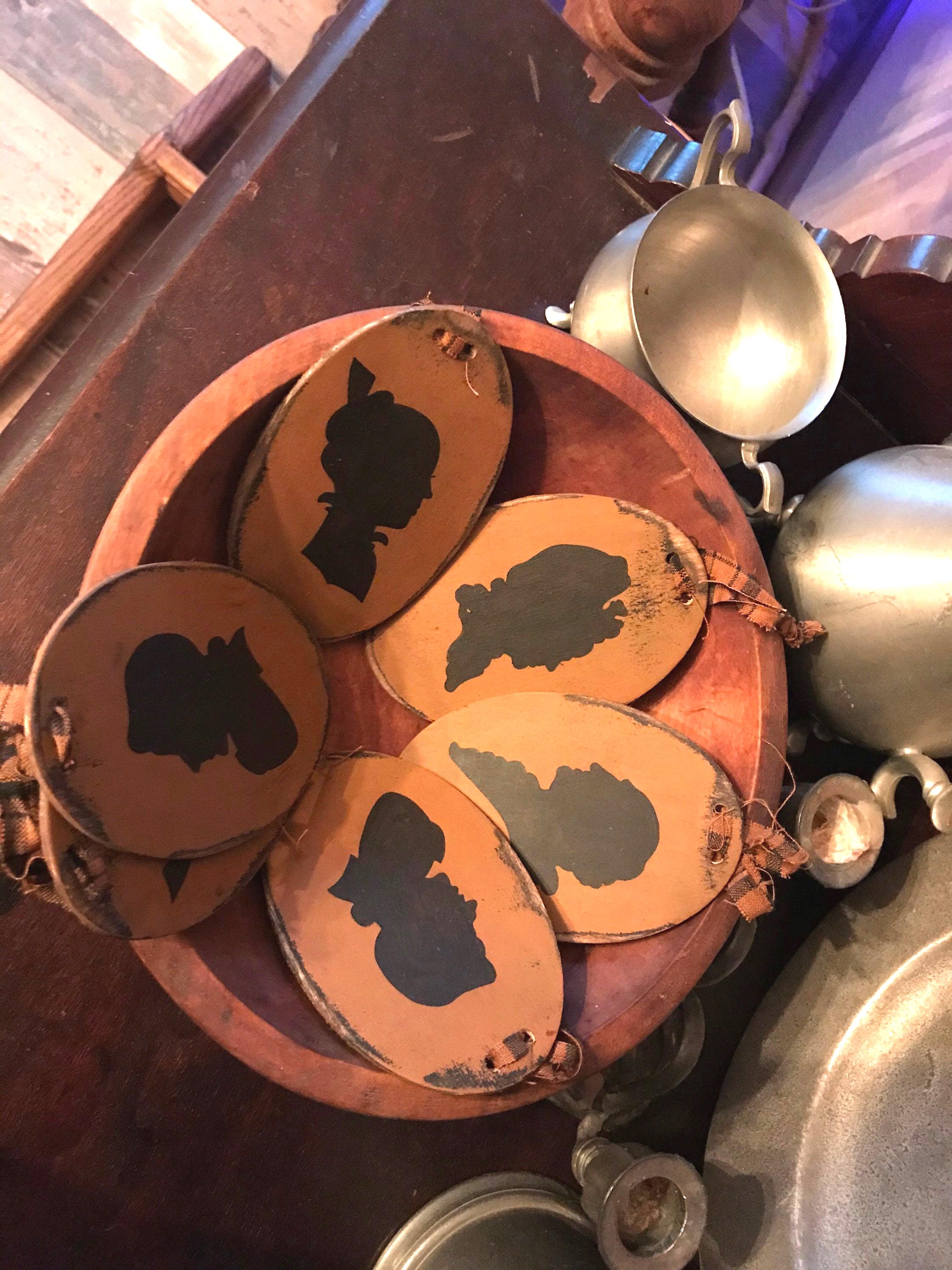 Primitive colonial style silhouette ornaments, crock tags