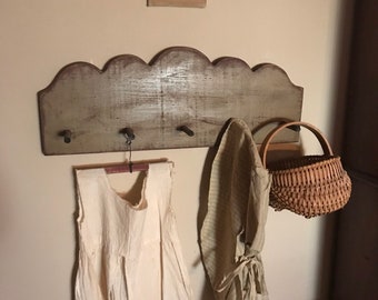 Primitive colonial round top scalloped peg rack