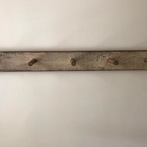 Primitive 24 inch slim peg rack