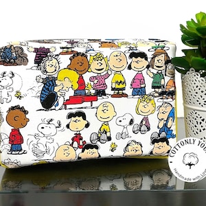 Riñonera de Snoopy y sus amigos con doble cremallera