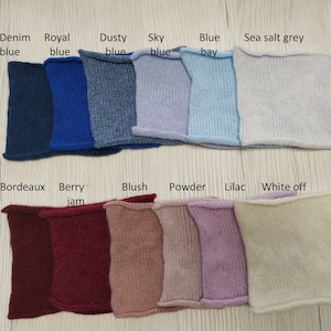 May include: A collection of 12 knitted fabric swatches in various colors, including denim blue, royal blue, dusty blue, sky blue, blue bay, sea salt grey, bordeaux, berry jam, blush, powder, lilac, and white off.