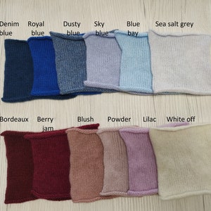 May include: Swatch cards showing 12 different knit fabric colors. The colors are: Denim blue, Royal blue, Dusty blue, Sky blue, Blue bay, Sea salt grey, Bordeaux, Berry jam, Blush, Powder, Lilac, and White off.