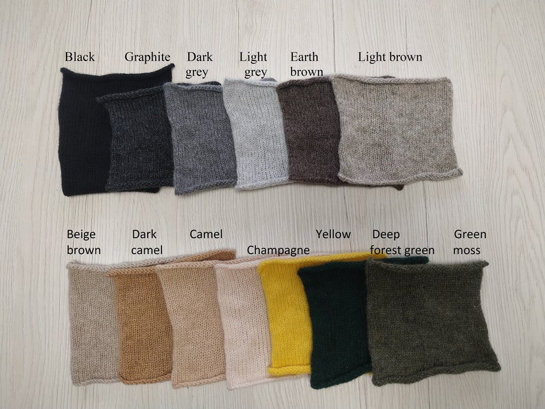 May include: Swatch card of 14 different knit fabric colors. The colors are: black, graphite, dark grey, light grey, earth brown, light brown, beige brown, dark camel, camel, champagne, yellow, deep forest green, and green moss.