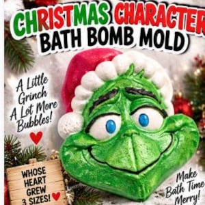 May include: A green character-shaped bath bomb mould wearing a red and white Santa hat. The text reads: CHRISTMAS CHARACTER BATH BOMB MOLD, A Little Grinch A Lot More Bubbles!, WHOSE HEART GREW 3 SIZES!, and Make Bath Time Merry! with red hearts.