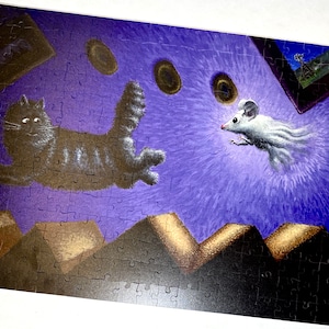 May include: A black and white cat leaps through the air, with a white mouse flying behind it. The background is a purple sky with brown and gold shapes.