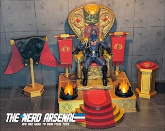 May include: A Cobra Commander action figure sits on a gold throne with a cobra hood backrest. The set includes a red cape on a stand, two red banners with Cobra logos, two black fire-effect bases, and a gold pedestal with a red top cushion.