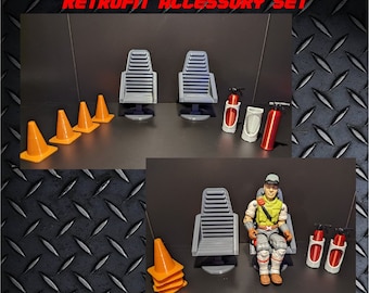 May include: A 3D printed accessory set for action figures, featuring two gray chairs, four orange traffic cones, and two red fire extinguishers. The set is labeled "U.S.S. FLAGG RETROFIT ACCESSORY SET" and "THE NERD ARSENAL WE ARE HERE TO ARM YOUR TOYS".