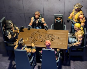 May include: Five action figures are seated around a wooden table with a skull and flames design. The figures are wearing various outfits, including leather jackets, jeans, and a cowboy hat. The table is set on a gray concrete floor.