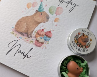 Personalised capybara birthday card. Pet capybara in a tin