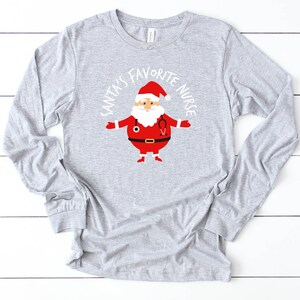 Santa&#39;s Favorite Nurse Nurse Shirt | Nurses | Nurse Apparel | Nurse Shirt | Nurse Gift | Nurse Humor | Funny Nurse Shirt | Nurse Life