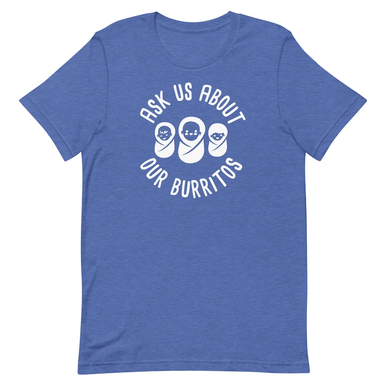 Puede incluir: Una camiseta azul con texto blanco que dice "Ask Us About Our Burritos" y tres caras de beb&eacute;s dentro de un c&iacute;rculo.