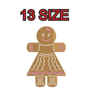 Peut inclure: Broderie représentant une femme en pain d'épices avec un nœud rose, des cheveux bruns, des détails en glaçage blanc et des bottes brunes. 13 TAILLE.