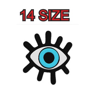 Op de afbeelding: Zwart en wit geborduurd oog met een blauwe pupil en witte iris. Het oog heeft een gestileerd ontwerp met stralende lijnen. De tekst "14 SIZE" staat boven het oog.