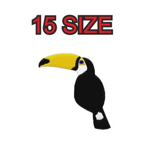 Peut inclure: Broderie de toucan avec un bec jaune, un corps noir et des accents blancs. Le toucan est tourné vers la gauche et a un œil bleu. Le texte "15 SIZE" est au-dessus du toucan.