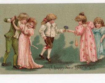 Antique Happy New Year dancing postcard - HNY, Hogmanay party, girls and boys, dancefloor, embossed festive, children, Stewart & Woolf