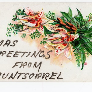 Cartão postal antigo de saudações de Natal com glitter - Mountsorrel. Leicestershire, lírios, buquê de flores, Victoriana, cartão de interesse local
