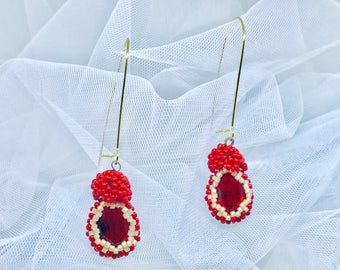 Blue earrings, Pierre Swarovski. Working Manual made with beads by hand.