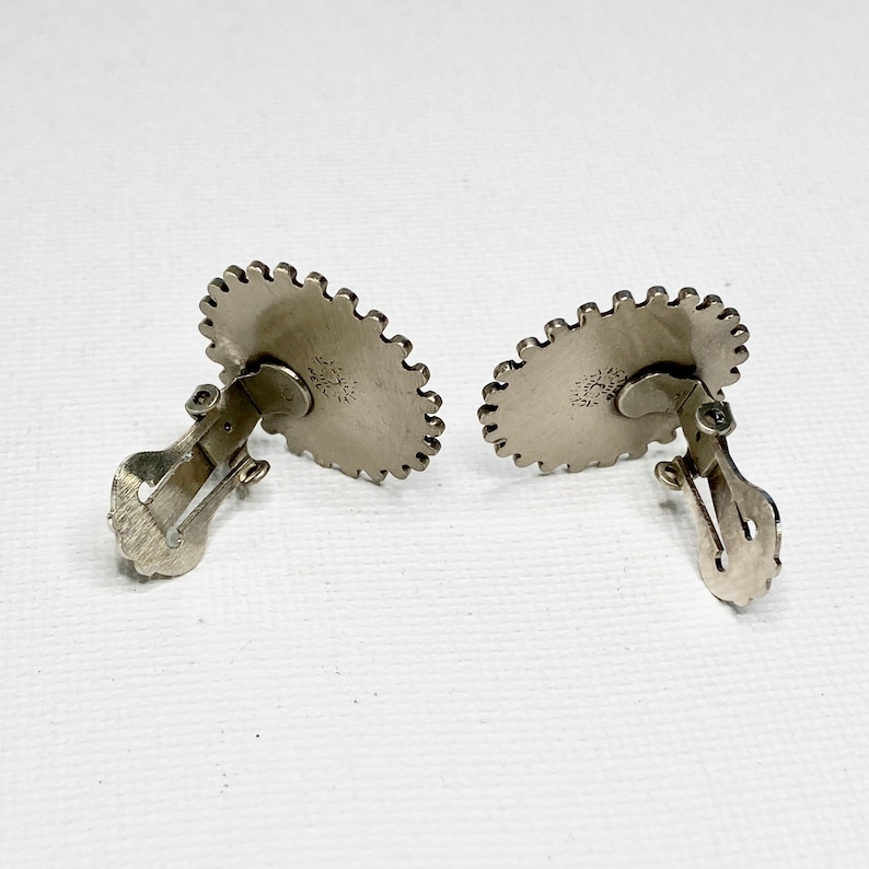 Bell Trading Nickel Silver Medallion Clip On Earrings Mid Century Vintage 1960s Southwestern Designer Clip Ons Starburst Earrings