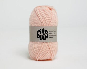 May include: A ball of pale pink Pingo wool yarn. The label reads "Pingo Wool" and "N'attrape pas froid" with a penguin logo.