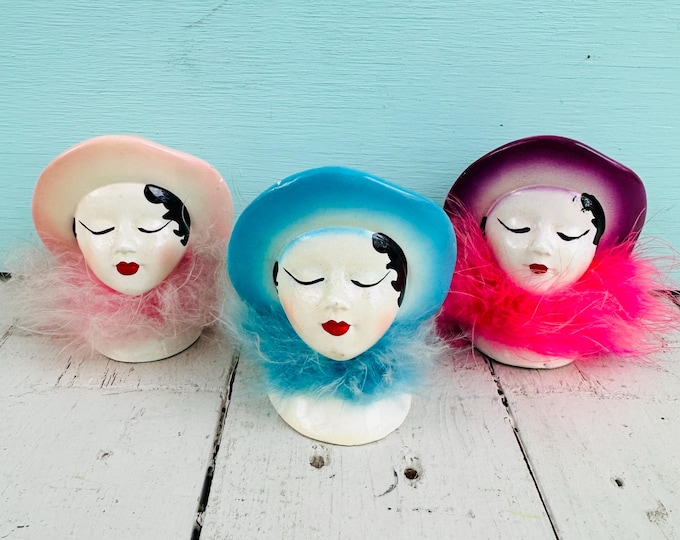 Vintage Trio Ceramic Flapper Head Figurines with hats and feather boas, pastel colors pink, blue, purple