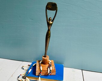 Trofeo Clio antiguo de la década de 1960, premio de la industria publicitaria, recuerdos publicitarios de mediados de siglo, figura de bronce