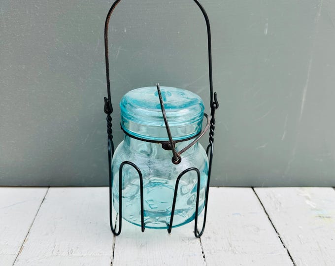 Antique blue Atlas EZ seal mason quart jar with wire carrier