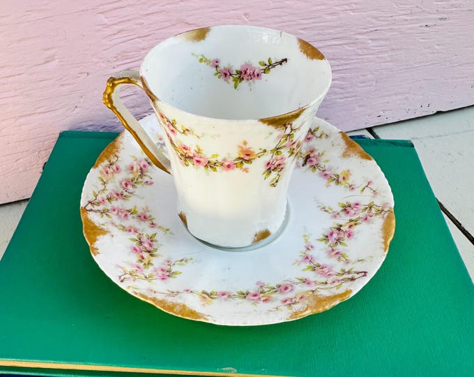 Antique Haviland Limoges porcelain chocolate cup and saucer with pink rose floral decoration