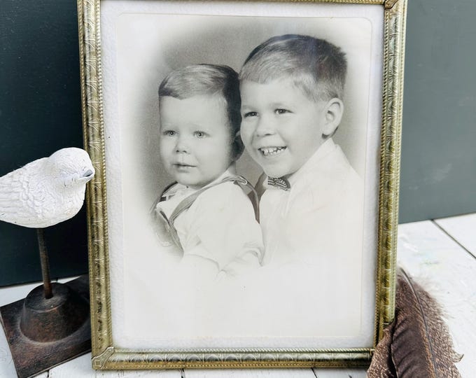 Vintage mid century framed studio portrait of two young boys, vintage photography ephemera