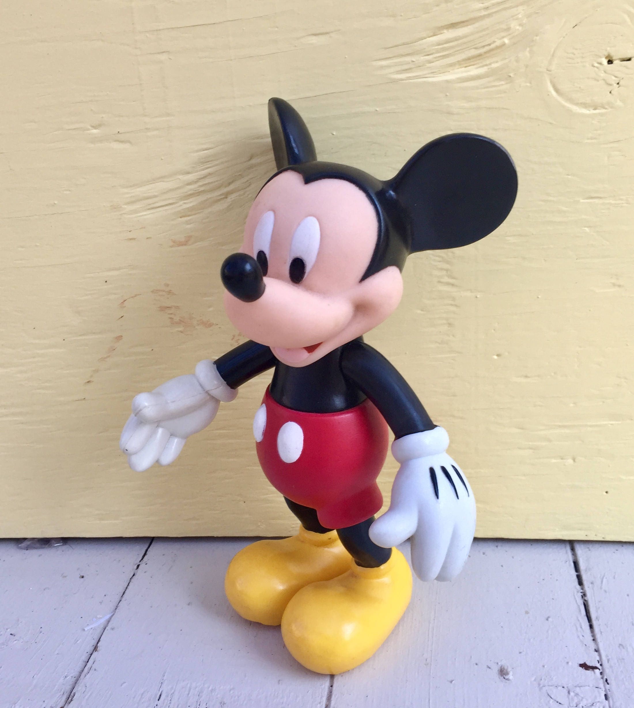 mickey mouse book with figurines