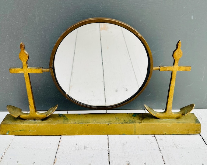 Vintage mid century brass decorative tabletop mirror with anchor motifs and a rectangular base