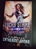 Signed paperbacks by Catherine Banks 