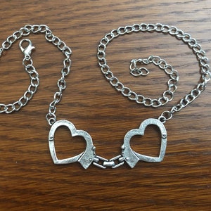 Criminal Undercover Heart Handcuff Necklace image 1