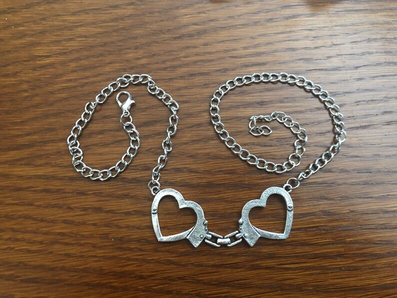 Criminal Undercover Heart Handcuff Necklace image 1