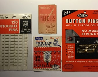 Vintage assortment of sewing-Lily nickel plated brass straight pins-Risdon brass button pins-Woolco needles holder-proms Hooks Eyes Loops