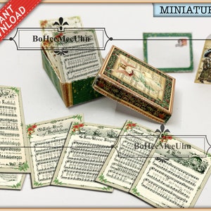 Villancicos de partituras de música navideña en una caja de exhibición antigua victoriana vintage con tarjeta de felicitación y sobre Casa de muñecas. Juego de 6