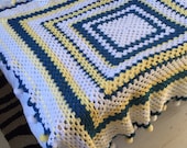 Blue, white and yellow large crochet blanket